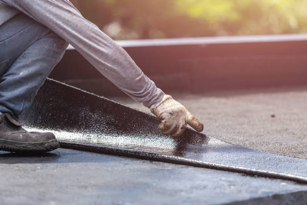 Professional Waterproofing technician working in Holland, MI
